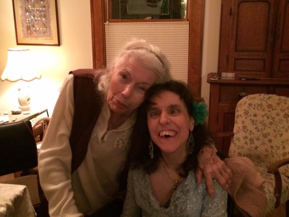 Rose being hugged by her mother.