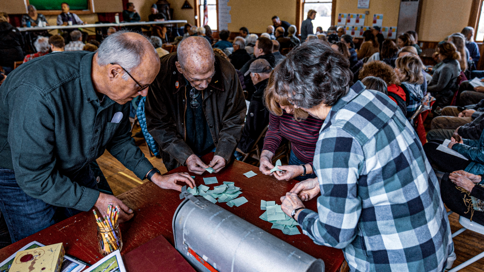 People counting votes at a town election