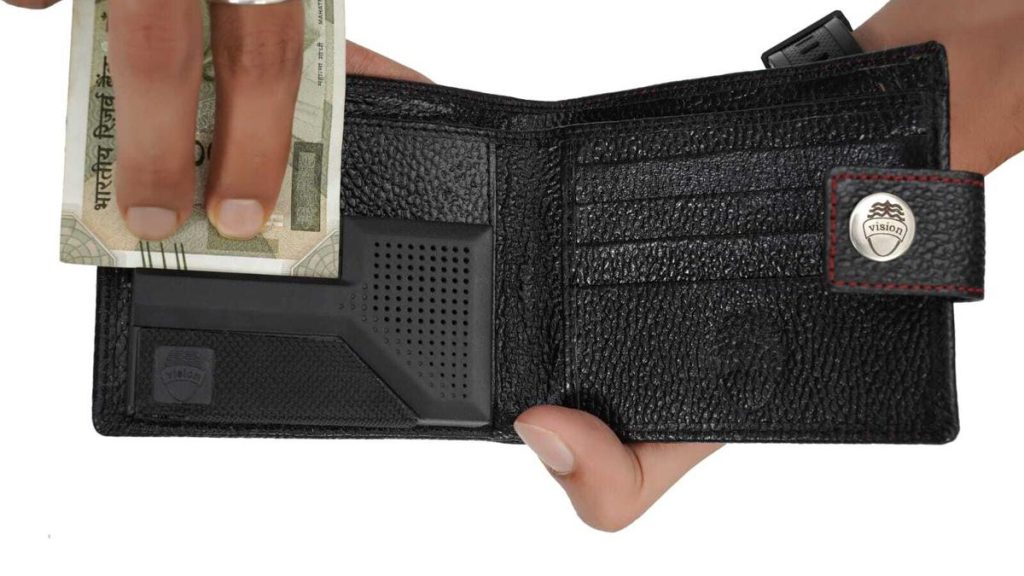 The Vision wallet identifies currency