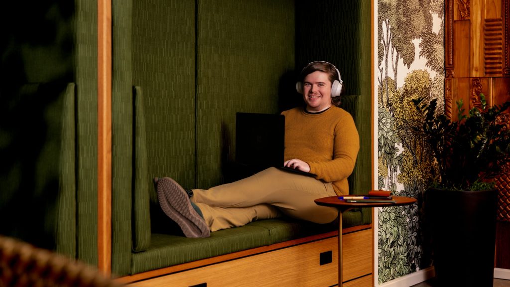 Man with headphone using a laptop